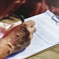 inspector writes findings in report on clipboard inspector writes findings in report on clipboard