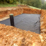 Membrane laid to separate the sand from the gravel in the construction of a sand and gravel filter bed Membrane laid to separate the sand from the gravel in the construction of a sand and gravel filter bed