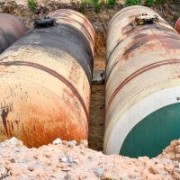 Large tank for gasoline in the excavated quarry for storage of petroleum products.