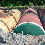 Large tank for gasoline in the excavated quarry for storage of petroleum products.